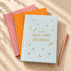 Celestial self-care journal trio with rose-gold pen