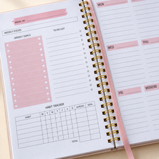 Open Weekly Planner with Ribbon Marker